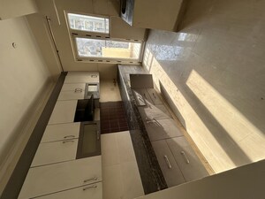 Kitchen in 3 BHK Apartment at Paramount Floraville, Sector 137 – for Rent