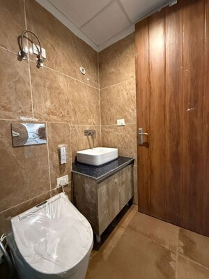 Bathroom in 4 BHK Apartment at T Homes Phase 1, Siddharth Vihar – for Rent