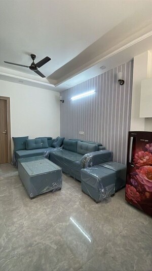 Living Room in 1 BHK Apartment at Sushant Lok I – for Rent