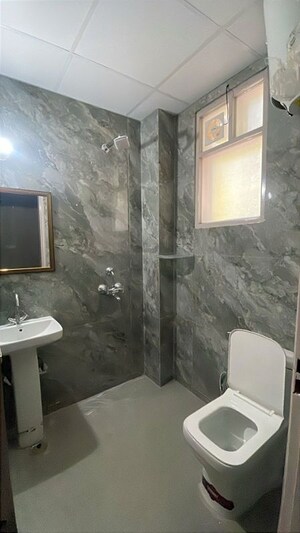 Bathroom in 1 BHK Apartment at Sushant Lok I – for Rent