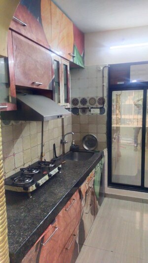Kitchen in 2 BHK Apartment at SPS White Carnation, Ulwe – for Rent
