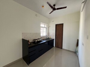 Kitchen in 2 BHK Apartment at Kolte Patil Life Republic 16th Avenue Arezo, Hinjewadi – for Rent