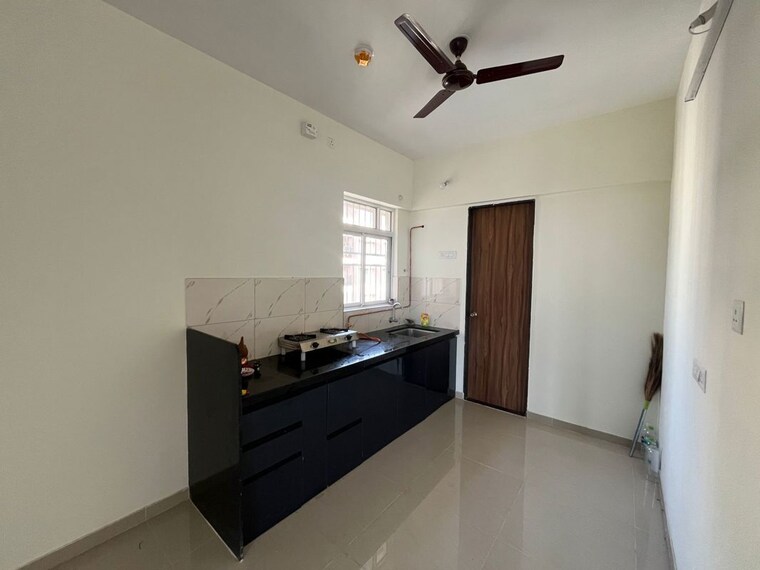 Kitchen, kolte-patil-life-republic-16th-avenue-arezo 2 Bedroom 680 Sq.Ft. Apartment In Hinjewadi Pune 10367252