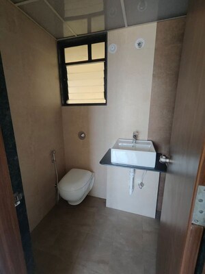 Bathroom in 3 BHK Apartment at Kohinoor Sportsville, Hinjewadi – for Rent
