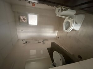 Bathroom in 3 BHK Apartment at ABA Cherry County, Tech Zone 4 Greater Noida – for Rent