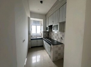 Kitchen in 2 BHK Apartment at Nimbus Express Park View - II, Chi V Greater Noida – for Rent