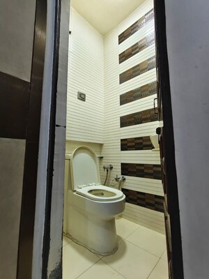 Bathroom in 3 BHK Builder Floor at Rohini Sector 7 – for Rent