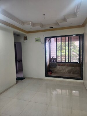 Living Room in 2 BHK Apartment at Swarna CHS, Kharghar Sector 7 – for Rent