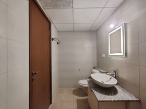 Bathroom in  Apartment at Bhartiya Nikoo Homes Phase 2, Thanisandra Main Road – for Rent