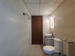 Bathroom in  Apartment at Bhartiya Nikoo Homes Phase 2, Thanisandra Main Road – for Rent