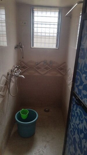 Bathroom in 1 BHK Apartment at Ashok Vatika CHS, Dombivli West – for Rent