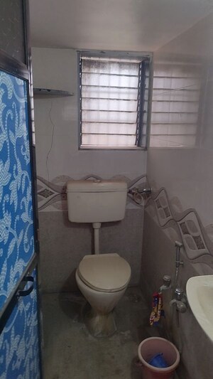 Bathroom in 1 BHK Apartment at Ashok Vatika CHS, Dombivli West – for Rent