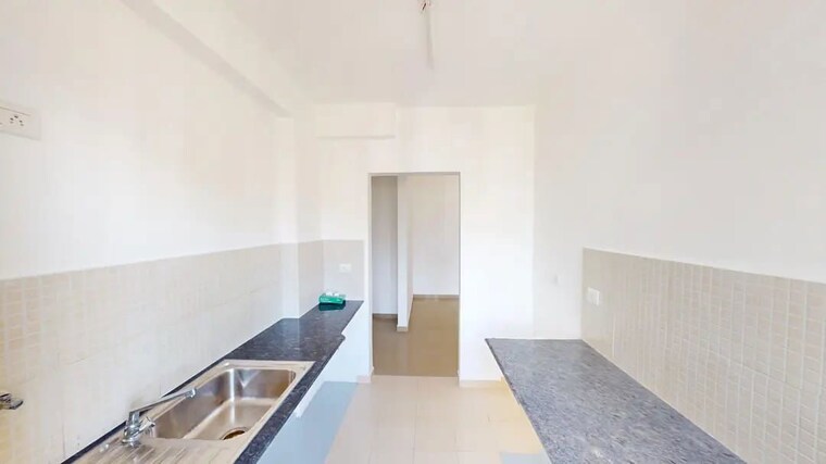 Kitchen, dlf-maiden-heights 2 Bedroom 939 Sq.Ft. Apartment In Jigani Bangalore 10367899