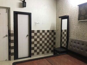 Room in 2 BHK Apartment at Aditya Aryan, Borivali East – for Rent
