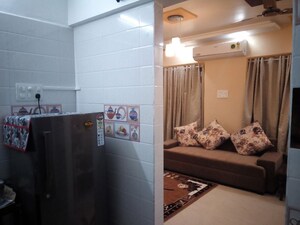 Living Room in 2 BHK Apartment at Essen Shonest Towers, Wakad – for Rent