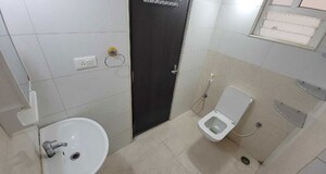Bathroom in 3 BHK Apartment at Sai Purvi Symphony, Gunjur – for Rent