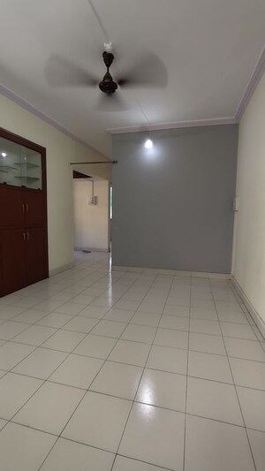 Living Room in 1.5 BHK Apartment at Raghuveer Nagar – for Rent