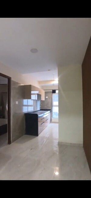 Kitchen in 2 BHK Apartment at Infinity Paradise CHS, Goregaon West – for Rent