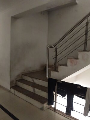 Staircase in  Apartment at Santoshi Nagar Slum – for Sale