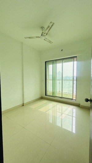 Bedroom in 2 BHK Apartment at Ekveera SB Tower, Dombivli East – for Sale