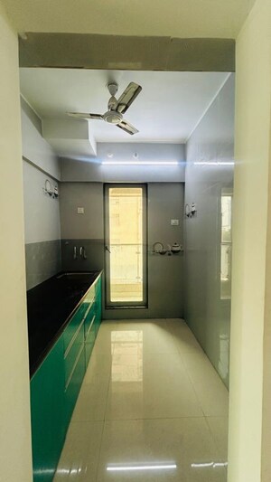 Kitchen in 2 BHK Apartment at Ekveera SB Tower, Dombivli East – for Sale
