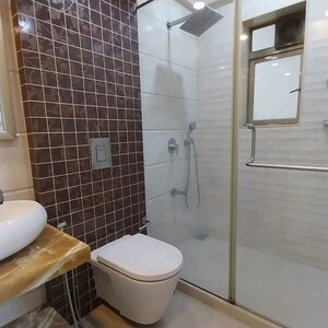 Bathroom in 4 BHK Apartment at Rustomjee Adarsh Excellency, Malad West – for Rent