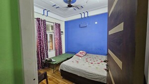 Bedroom in 3 BHK Builder Floor at Dharam Colony – for Rent