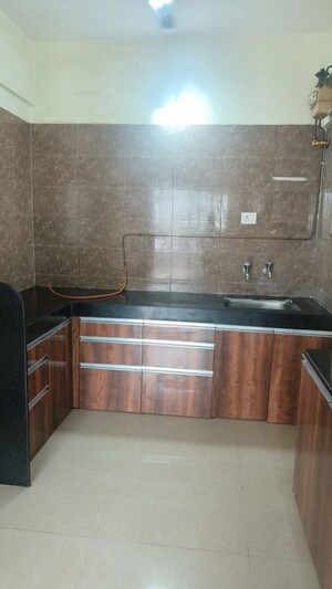 Kitchen in 3 BHK Apartment at Manav Silver Skyscapes, Wakad – for Rent