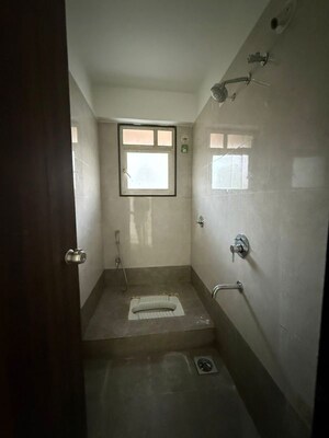 Bathroom in 2 BHK Apartment at Urban Skyline Phase 1, Ravet – for Rent
