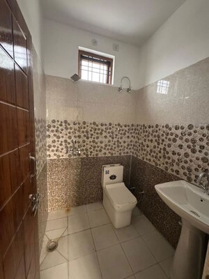 Bathroom in 3 BHK Builder Floor at Ballupur – for Rent