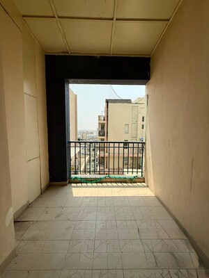 Room in 3 BHK Apartment at Sushma Elite Cross, Dhakoli – for Rent