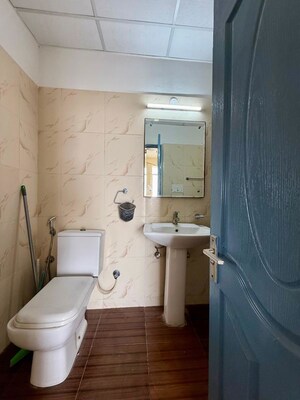 Bathroom in 3 BHK Apartment at Sushma Elite Cross, Dhakoli – for Rent