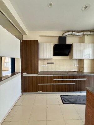 Kitchen in 3 BHK Apartment at Sushma Elite Cross, Dhakoli – for Rent