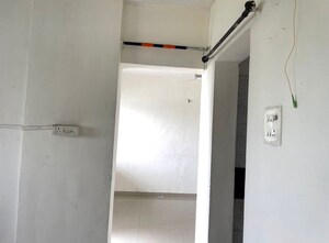 Building Lobby in 1 BHK Apartment at JK Hill Park, Dhayari – for Sale