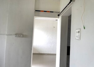 Building Lobby in 1 BHK Apartment at JK Hill Park, Dhayari – for Sale