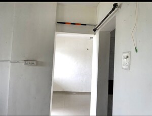 Building Lobby in 1 BHK Apartment at JK Hill Park, Dhayari – for Sale