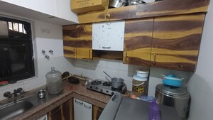 Kitchen in 2 BHK Apartment at Logix Blossom County, Sector 137 – for Sale