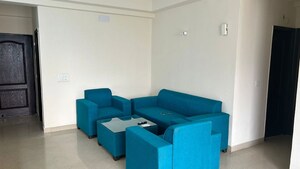 Living Room in 3.5 BHK Apartment at Aims Golf City, Sector 75 – for Rent