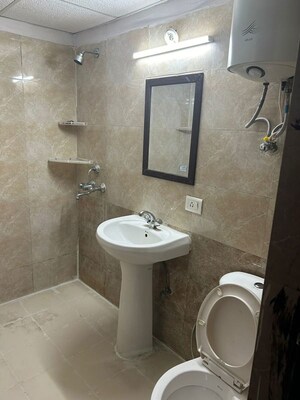 Bathroom in 3.5 BHK Apartment at Aims Golf City, Sector 75 – for Rent