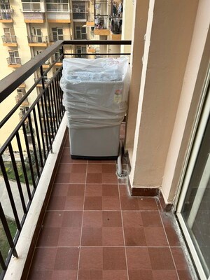 Balcony in 3.5 BHK Apartment at Aims Golf City, Sector 75 – for Rent