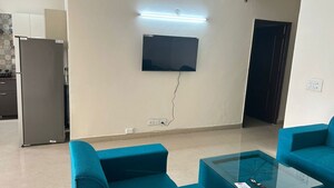 Tv Room in 3.5 BHK Apartment at Aims Golf City, Sector 75 – for Rent