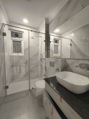 Bathroom in 3 BHK Builder Floor at Chittaranjan Park – for Sale