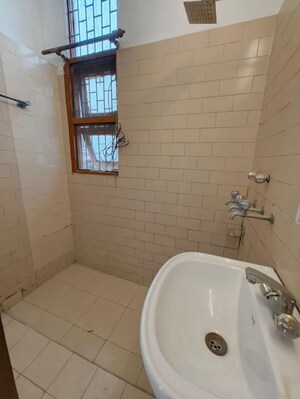 Bathroom in 3 BHK Builder Floor at Kalkaji – for Rent