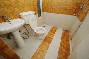Bathroom in 2 BHK Apartment at Proview Officer City 2, Raj Nagar Extension – for Sale