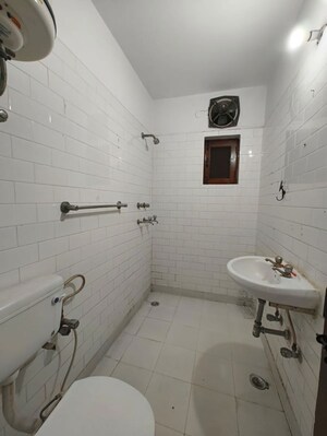 Bathroom in 3 BHK Builder Floor at Kalkaji – for Rent