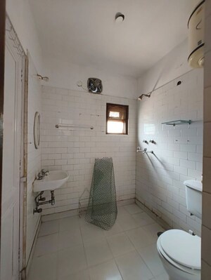 Bathroom in 3 BHK Builder Floor at Kalkaji – for Rent