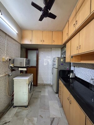 Kitchen in 1 BHK Apartment at Riddhi Garden, Malad East – for Sale