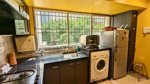 Kitchen in 1 BHK Apartment at Bandra West – for Rent