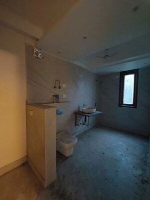 Bathroom in 4 BHK Builder Floor at Nehru Enclave – for Sale