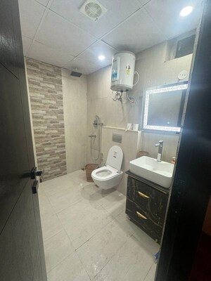 Bathroom in 3 BHK Apartment at Jaypee Green Pavillion Heights, Sector 128 – for Rent